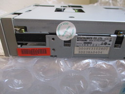 Right profile of the drive with "warranty void when seal is broken" sticker.